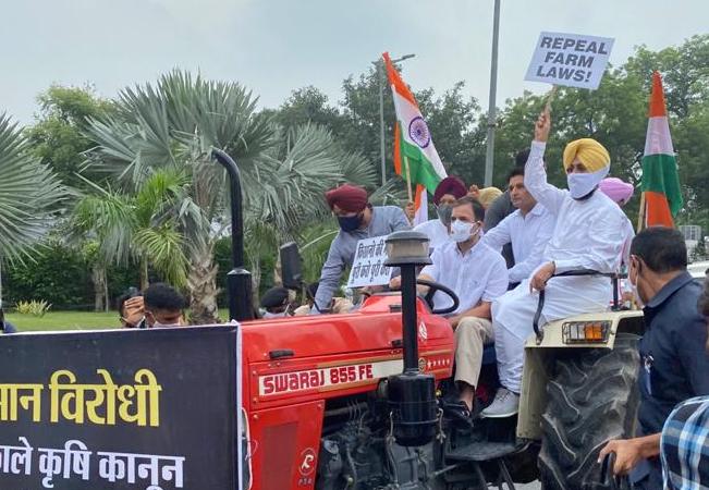Rahul Gandhi in Action comes with Tractor in Parliament.