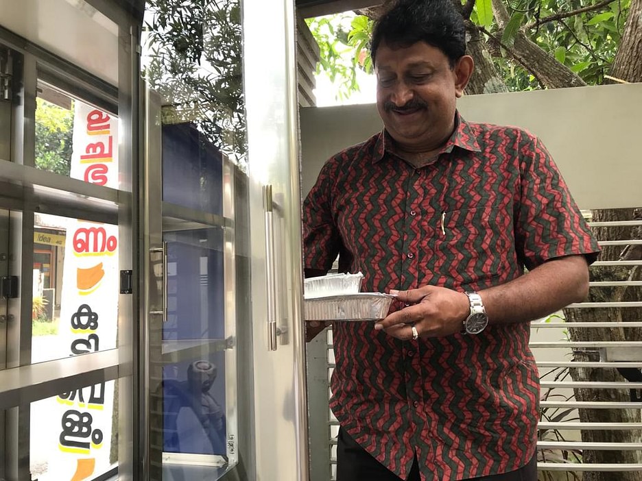 Doing good in tough times, Bullet Man, aka Kerela man, distributes food packets among needy kids.