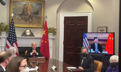 Biden asks Xi to "play by the rules of the road"