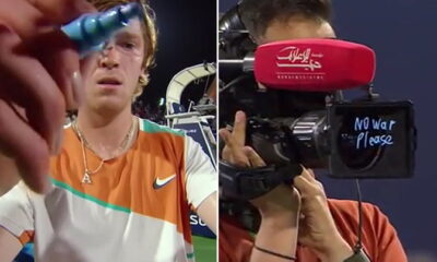 A Russian tennis player, Rublev, writes 'No War Please'