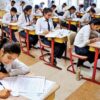Board Exam: Std. 10 students take exams in the classroom. The first paper is easy.