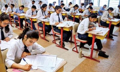 Board Exam: Std. 10 students take exams in the classroom. The first paper is easy.