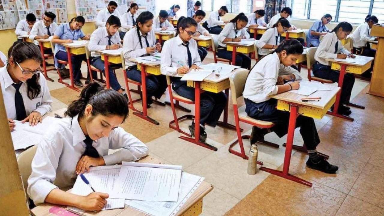 Board Exam: Std. 10 students take exams in the classroom. The first paper is easy.