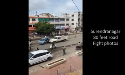 photos of surendranagar 80 feet road fight between two groups near ultra vision school