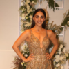 Kiara Advani a deep-neck gold gown