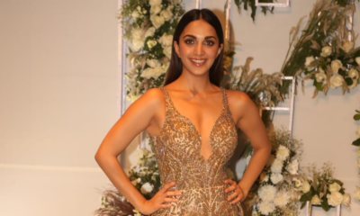 Kiara Advani a deep-neck gold gown