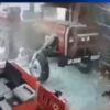 Tractor without driver enters the shop