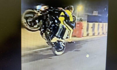 Mumbai man with two girls performs dangerous stunt on a bike
