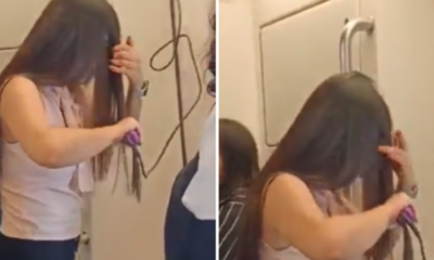 video of Girl straightener in Delhi metro
