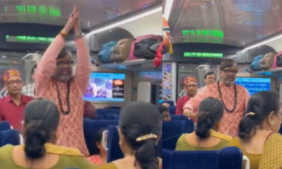 Passengers performing Yoga in train on Yoga day