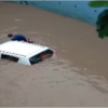 car stuck at waterlogged in Gujarat Navsari