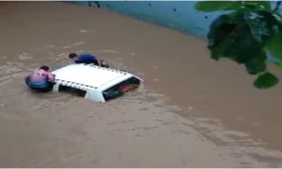 car stuck at waterlogged in Gujarat Navsari