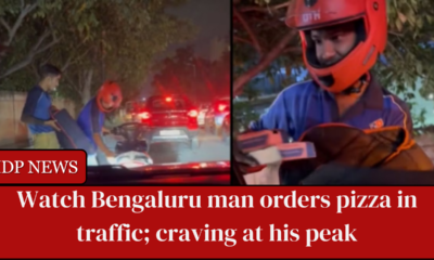 A video of a Bengaluru man orders Pizza in heavy traffic is getting viral on the Internet, as it shows that craving over anything.