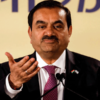 The Congress accused the Gujarat government of overpaying Adani Power by Rs 8,200 crore.