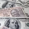 Forex traders said news of dollar selling by public sector banks backed the Indian currency. However, higher crude oil costs restricted the gains in the local unit.