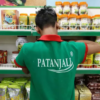 Patanjali Foods Ltd will buy Patanjali Ayurved Ltd's home and personal care division for ₹1,100 crore.