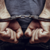 Mumbai police detained a Singapore citizen at Ahmedabad airport for his participation in fraud.