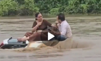 Gujarat Floods: During rains in areas of Gujarat, a couple found themselves stuck on the top of their submerged automobile