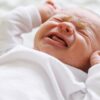 Colic, characterized by excessive crying and fussiness, usually affects newborns under three months old.