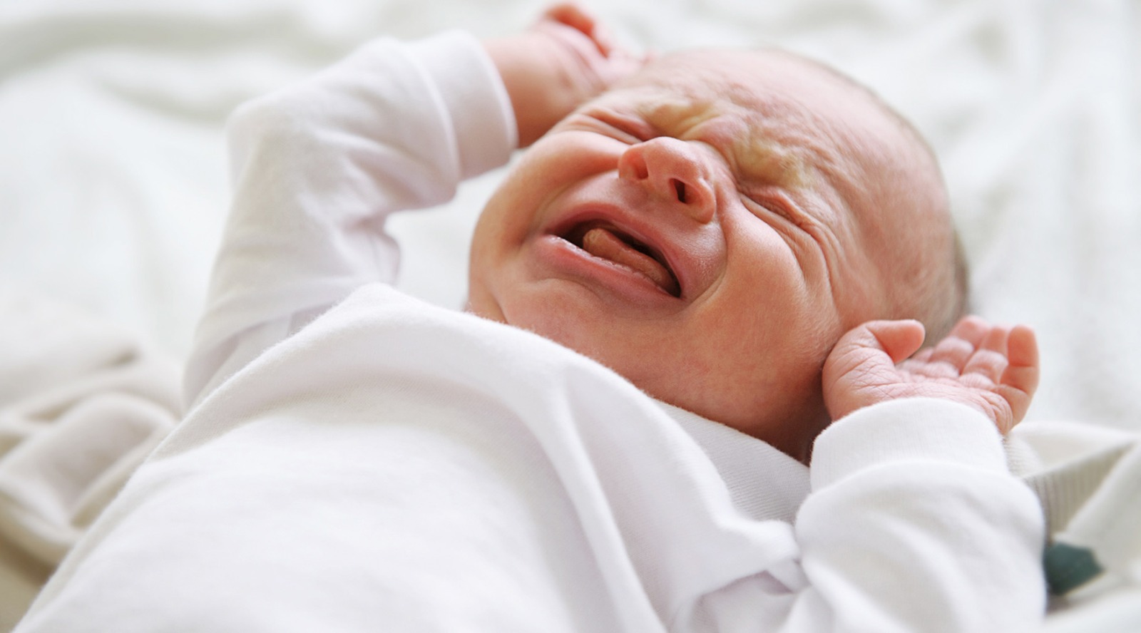 Colic, characterized by excessive crying and fussiness, usually affects newborns under three months old.