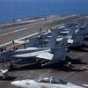 Deployment of third aircraft carrier heightens tensions with Iran.