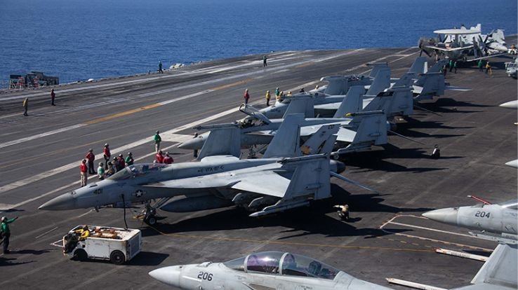 Deployment of third aircraft carrier heightens tensions with Iran.